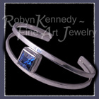 Sterling Silver and Fantasy Cut Glacier Blue Topaz 'Arctic Star' Bracelet Image