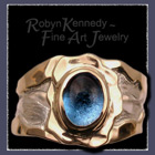 18 Karat Yellow Gold, Sterling Silver & Blue Topaz Ring Image