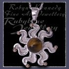10 Karat Yellow Gold, Sterling Silver and Tiger's Eye 'Sun' Pendant Image