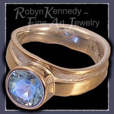 10 Karat Yellow Gold, Sterling Silver and Genuine Sky Blue Topaz 'Bliss' Ring Image