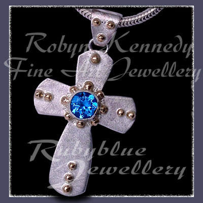 10 Karat Yellow Gold, Swiss Blue Topaz 'Cherish' Cross Pendant Image