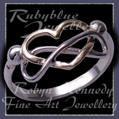 14 Karat Yellow Gold and Sterlium Sterling Silver 'Eternal Love' Ring Image