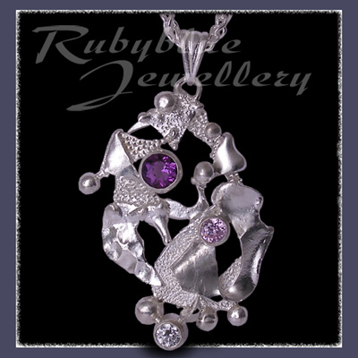 Sterling Silver, Amethyst, Lavendar Cubic Zirconia & White Cubic Zirconia 'Phoenix' Pendant