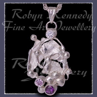 Sterling Silver, Cubic Zirconia, Lavendar Cubic Zirconia and Amethyst 'Phoenix' Pendat Image