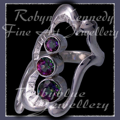 Sterling Silver and Swarovski Green Mystic Topaz 'Past, Present, Future' Ring Image