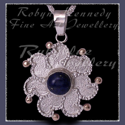 10 Karat Yellow Gold, Sterlling Silver and Lapis Lazuli 'Sun' Pendant Image