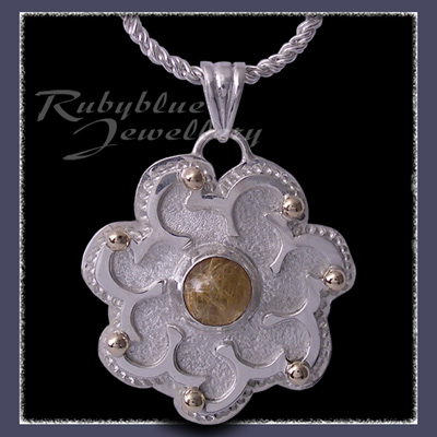 10 Karat Yellow Gold, Sterlling Silver and Rutilated Quartz 'Sun' Pendant Image