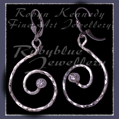 Sterling Silver and Swarovski Cubic Zirconia 'Swirls' Earrings Image